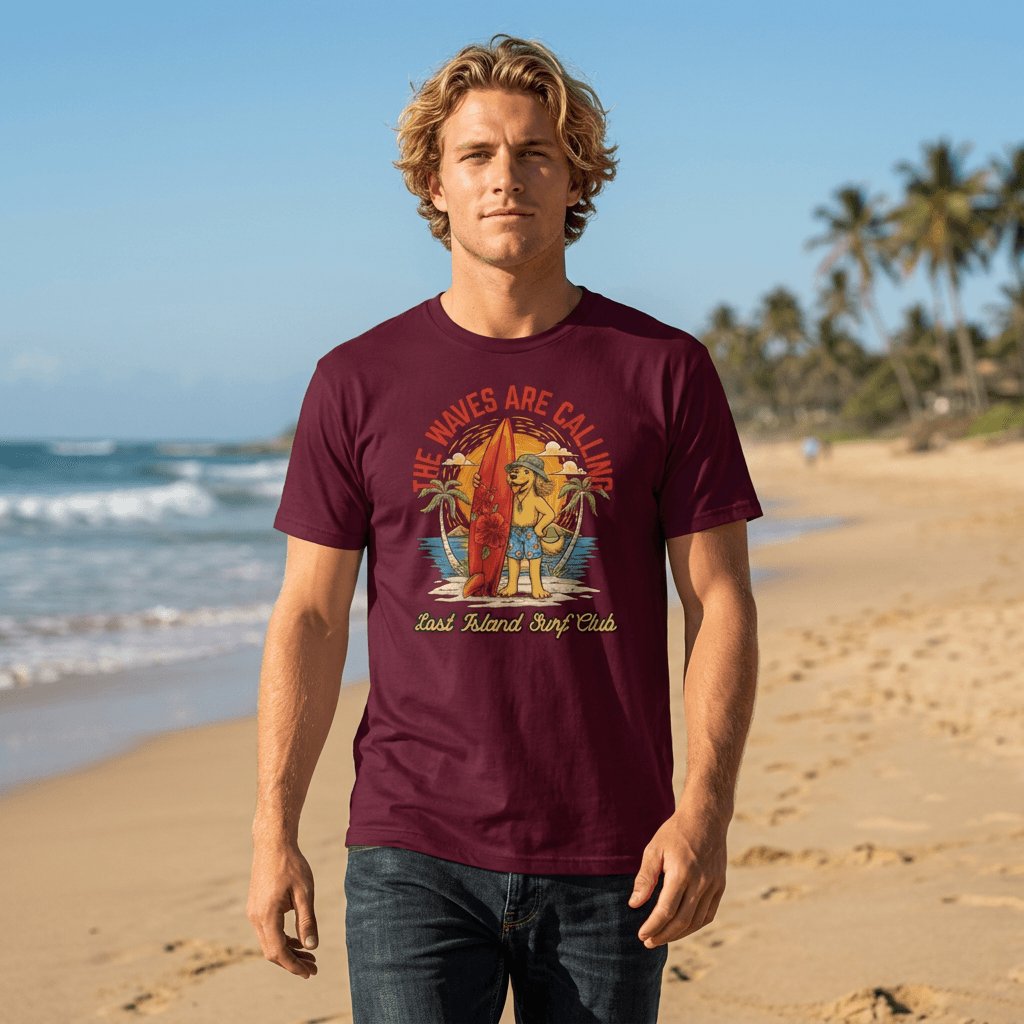 Unisex maroon cotton T-shirt featuring a colorful graphic of a dog holding a surfboard with tropical scenery and the text 'The Waves Are Calling' for streetwear style